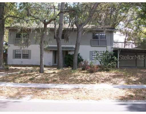 2101 Good Homes Road Orlando, FL 32818 - Photo 1 of 1 a backyard of a house
