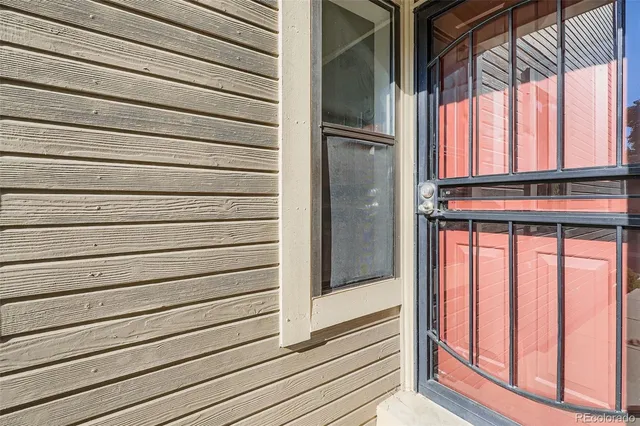 a view of front door and bedroom