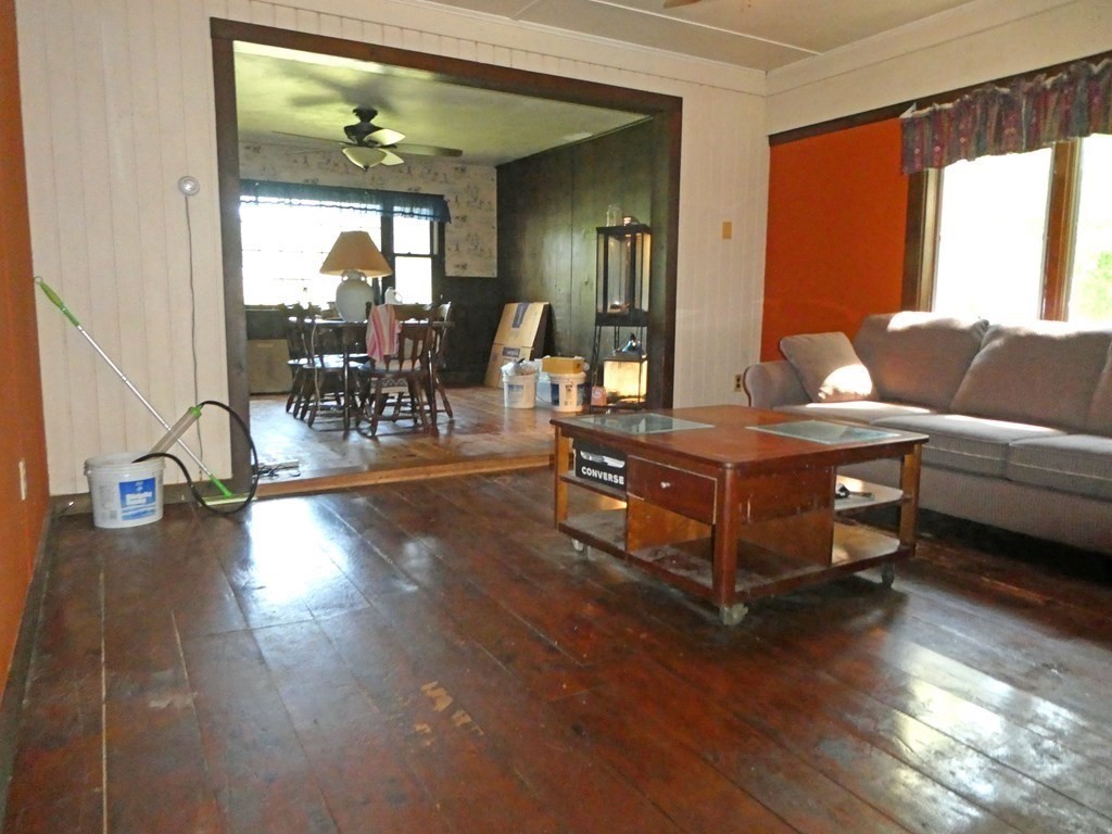 496 Wareham Street Middleboro, MA 02346 - Photo 20 of 34 a living room with furniture and a table