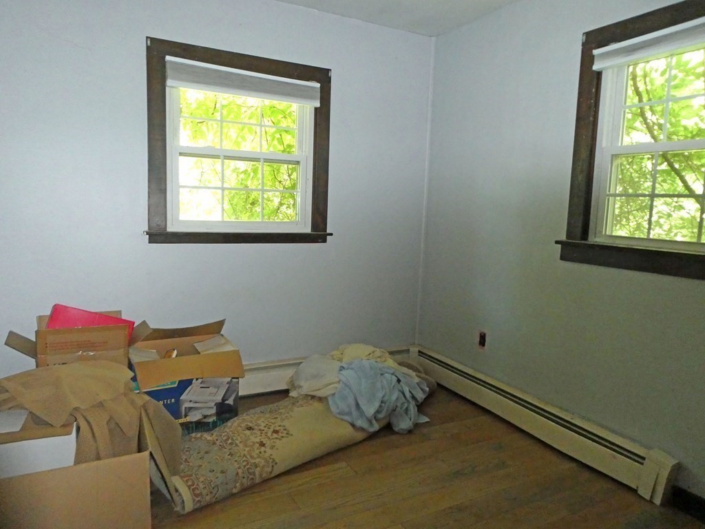 496 Wareham Street Middleboro, MA 02346 - Photo 23 of 34 a bedroom with a bed and a window