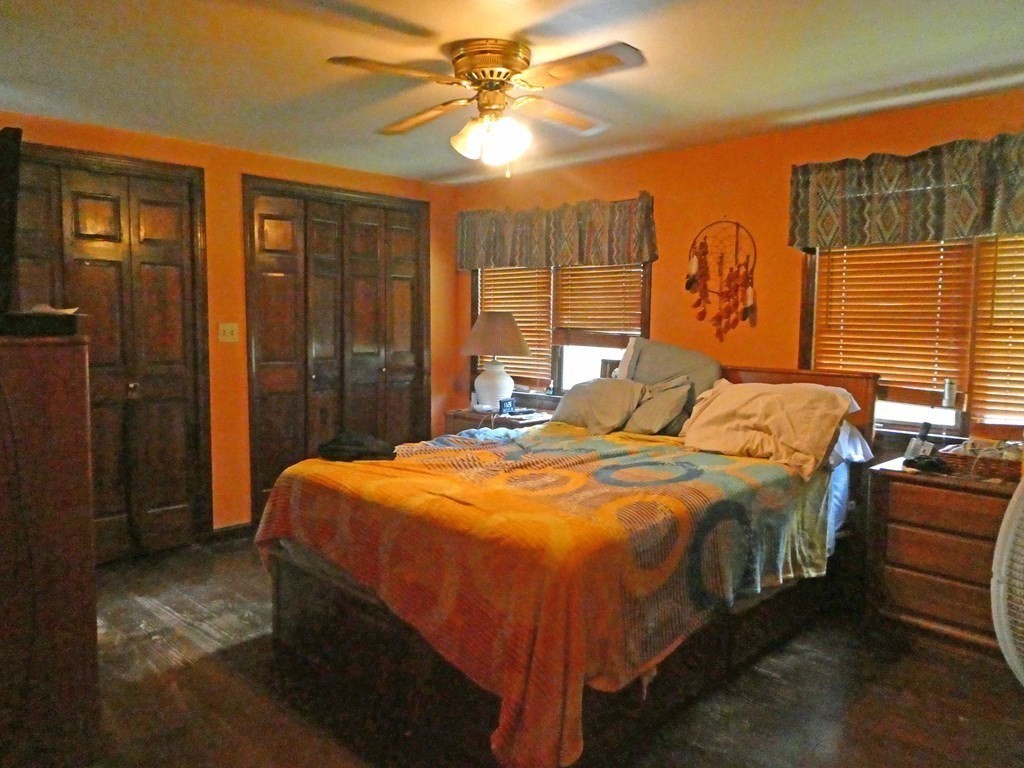 496 Wareham Street Middleboro, MA 02346 - Photo 27 of 34 a bed sitting in a bedroom next to a window