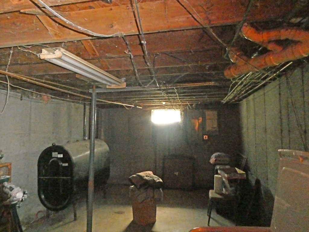 496 Wareham Street Middleboro, MA 02346 - Photo 31 of 34 a bathroom with a sink and mirror