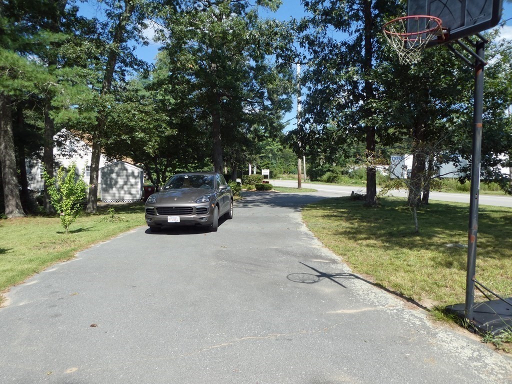 496 Wareham Street Middleboro, MA 02346 - Photo 32 of 34 a car parked on the side of the road