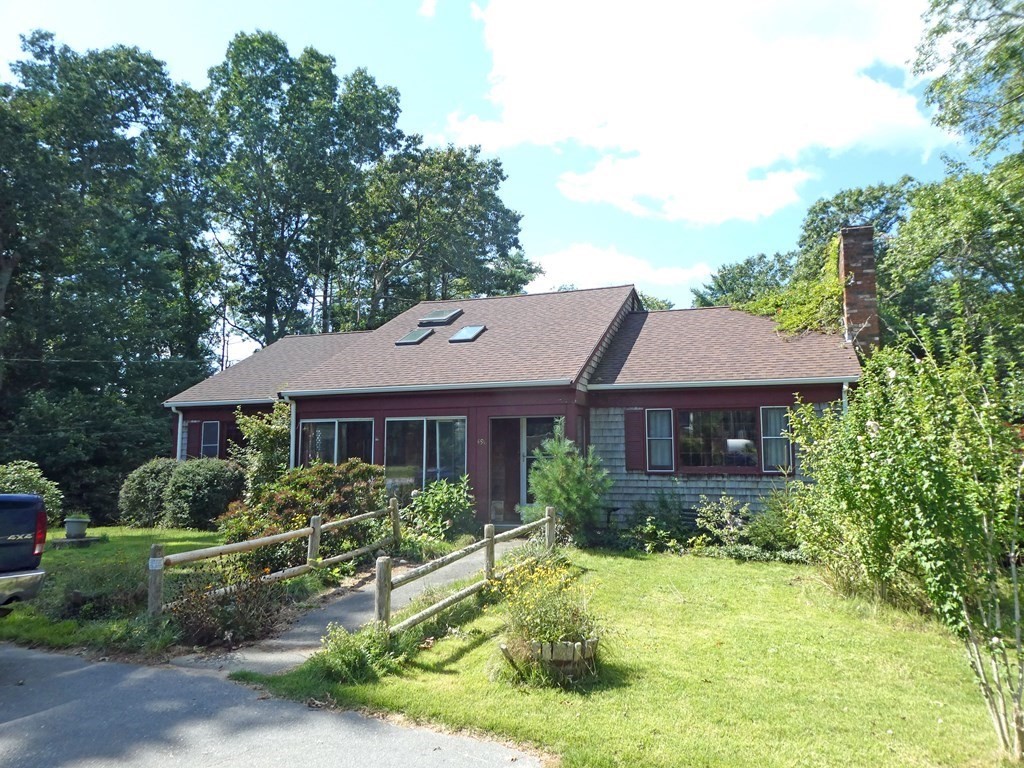 496 Wareham Street Middleboro, MA 02346 - Photo 4 of 34 a front view of a house with a yard