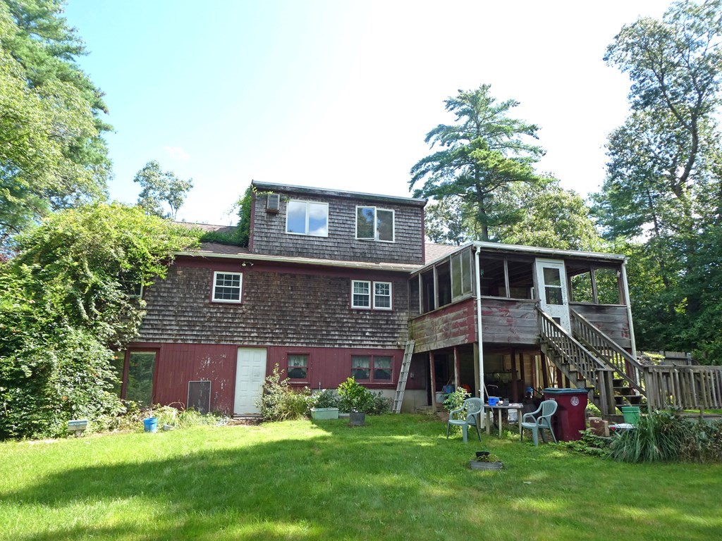 496 Wareham Street Middleboro, MA 02346 - Photo 6 of 34 front view of a house with a yard
