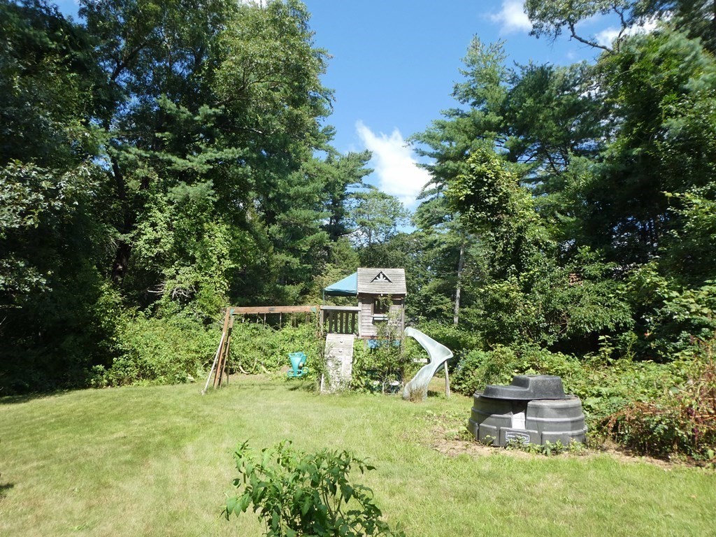 496 Wareham Street Middleboro, MA 02346 - Photo 10 of 34 front view of a house with a yard