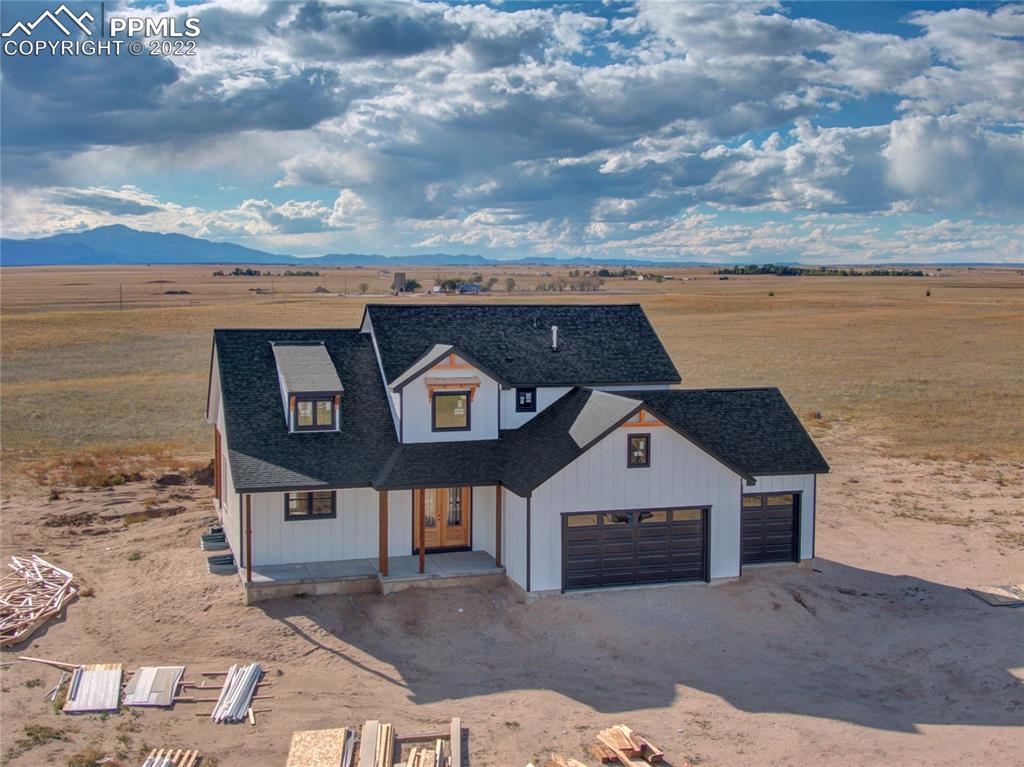 2420 North Log Road Calhan, CO 80808 - Photo 16 of 47 a view of a terrace with sky view