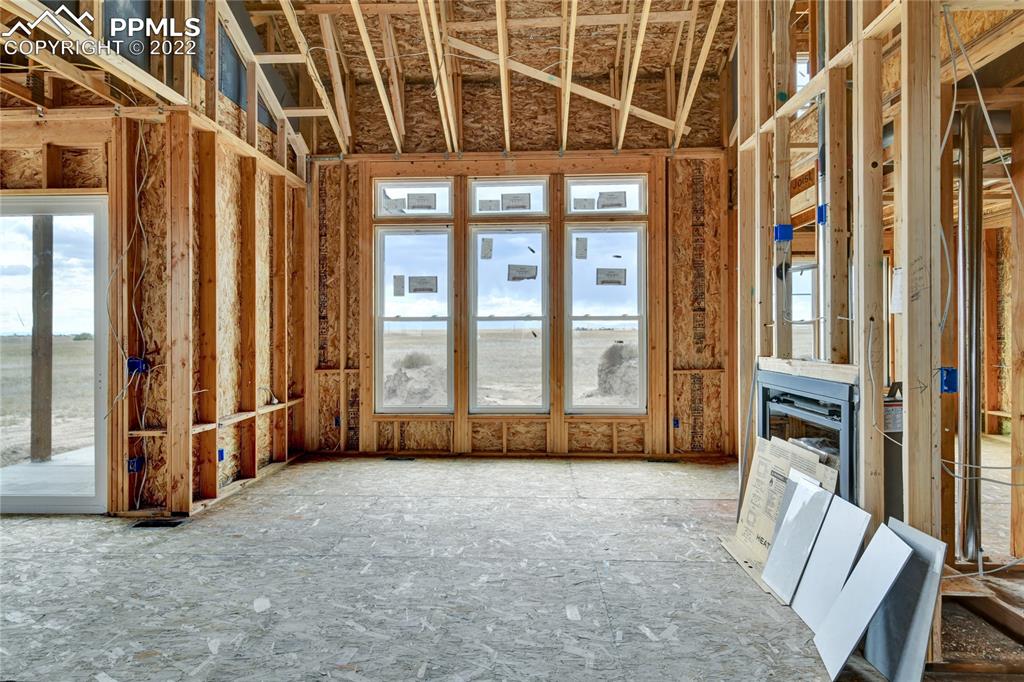 2420 North Log Road Calhan, CO 80808 - Photo 26 of 47 a view of an entryway with staircase