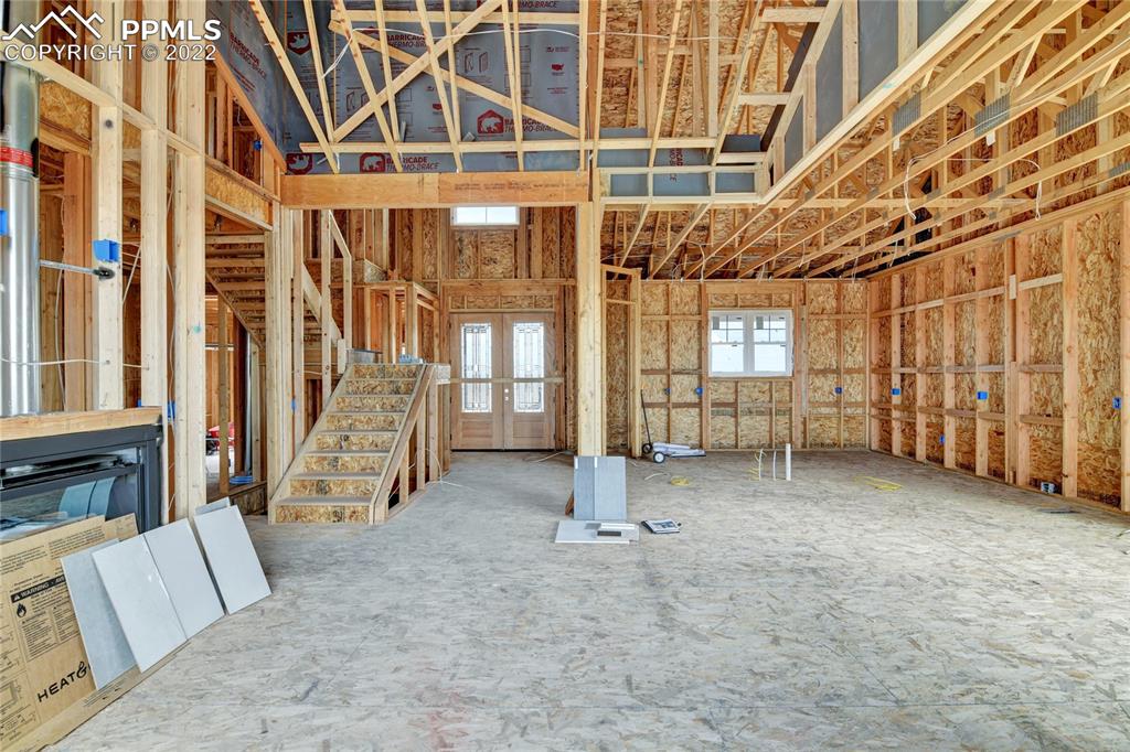 2420 North Log Road Calhan, CO 80808 - Photo 27 of 47 a view of an empty room with a window