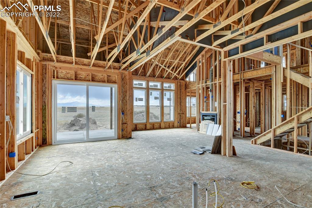 2420 North Log Road Calhan, CO 80808 - Photo 29 of 47 a large room with windows