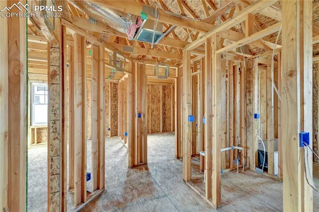 a view of a bathroom with a shower and door