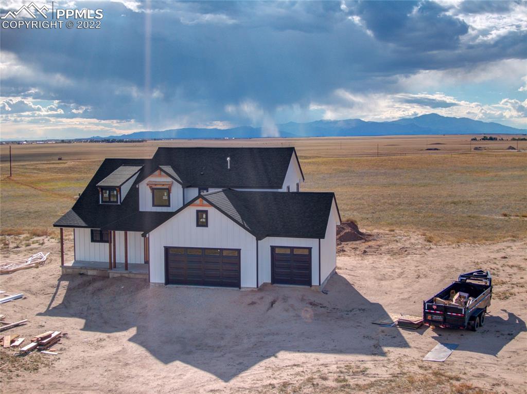 2420 North Log Road Calhan, CO 80808 - Photo 6 of 47 a front view of a house with ocean view