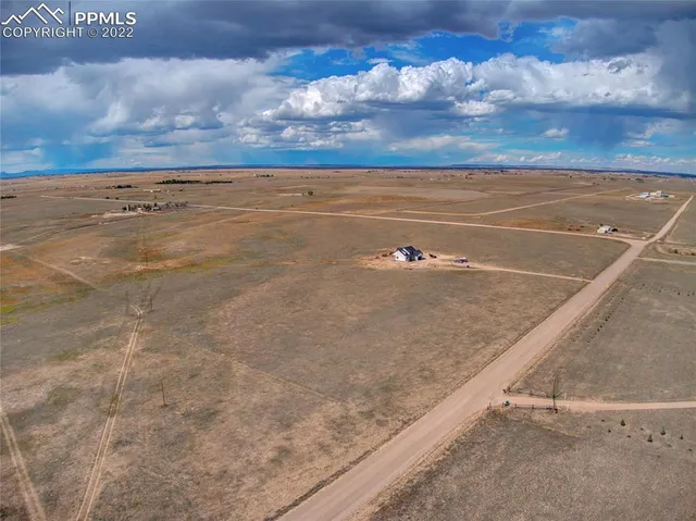 a view of an outdoor space and tennis court