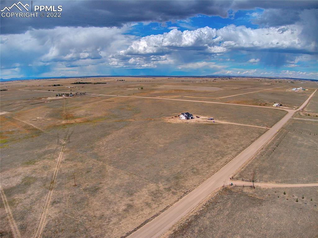 2420 North Log Road Calhan, CO 80808 - Photo 10 of 47 a view of an outdoor space and tennis court