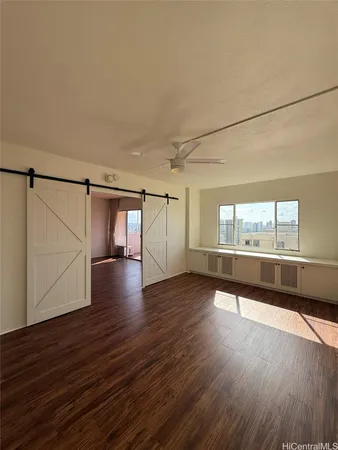 a view of a building with wooden floor and a window