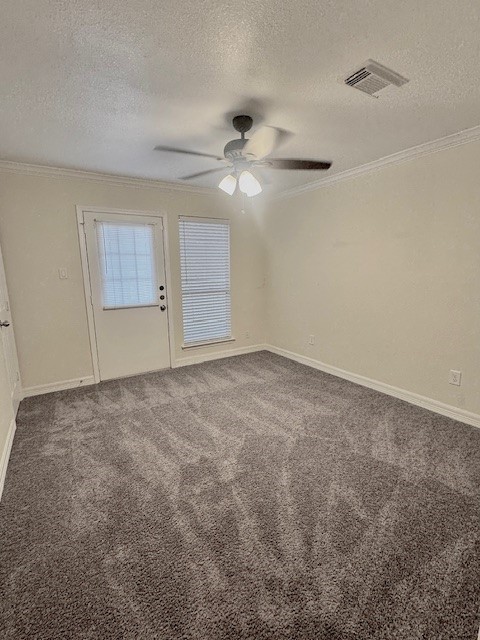 14020 Schroeder Road, Unit 151 Houston, TX 77070 - Photo 17 of 26 en empty room with ceiling fan and window