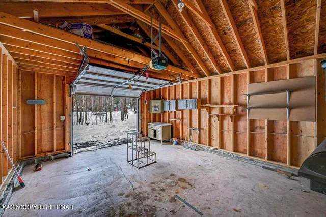 a view of a house with a snow in the yard
