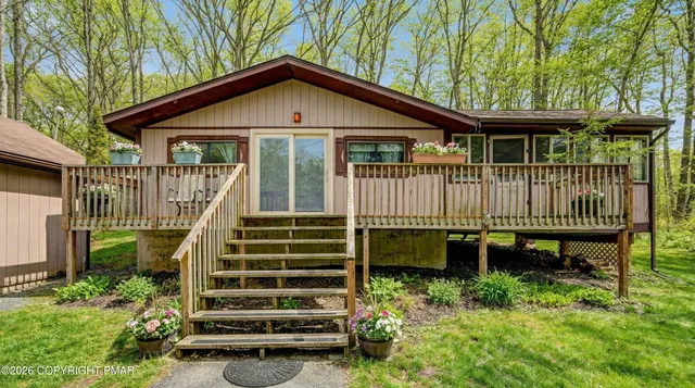 a front view of a house with patio