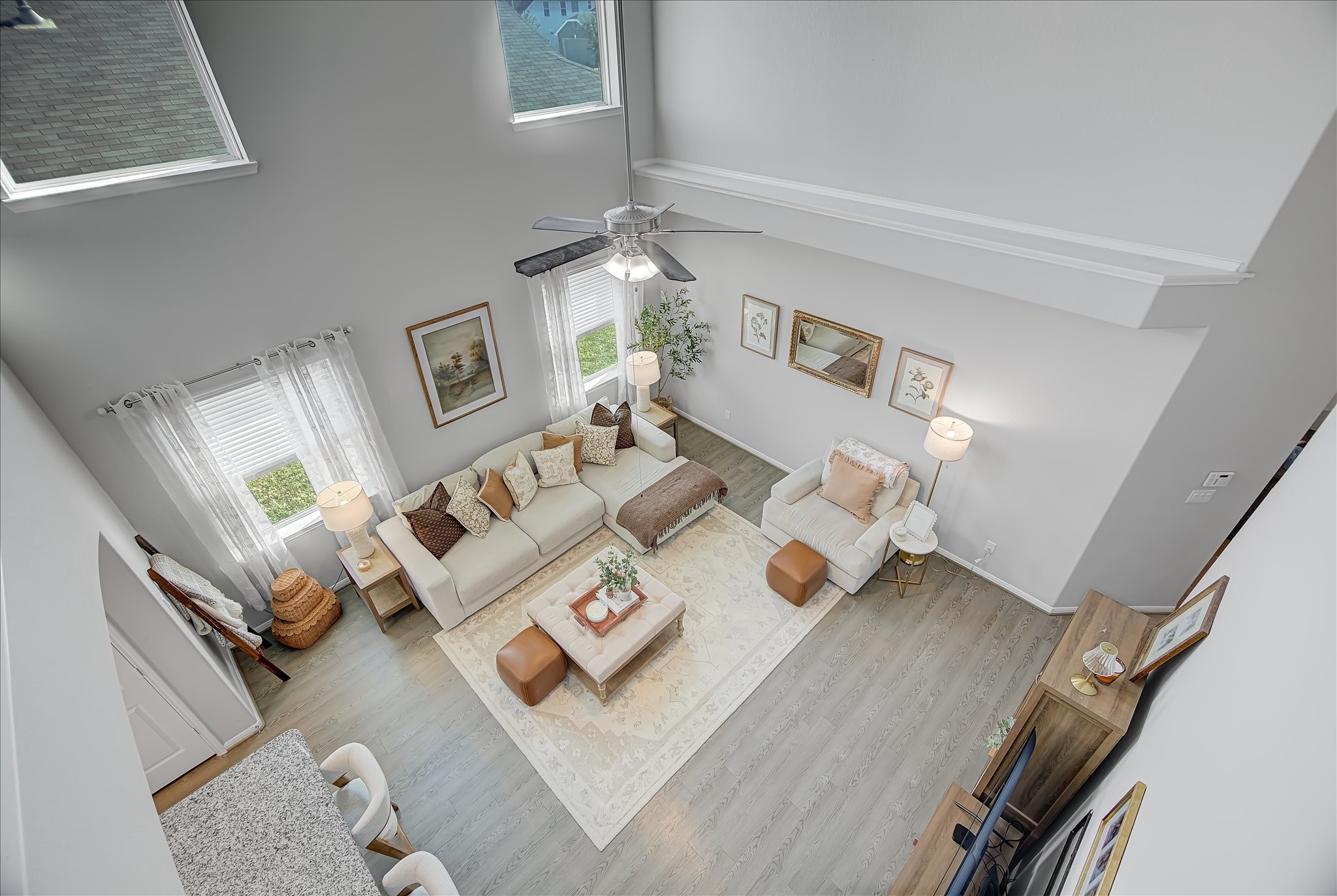 6014 Prince Place Drive Rosenberg, TX 77471 - Photo 16 of 28 The upstairs overlook offers a great view of the main living area below, adding an open, airy feel and a sense of connection between levels.