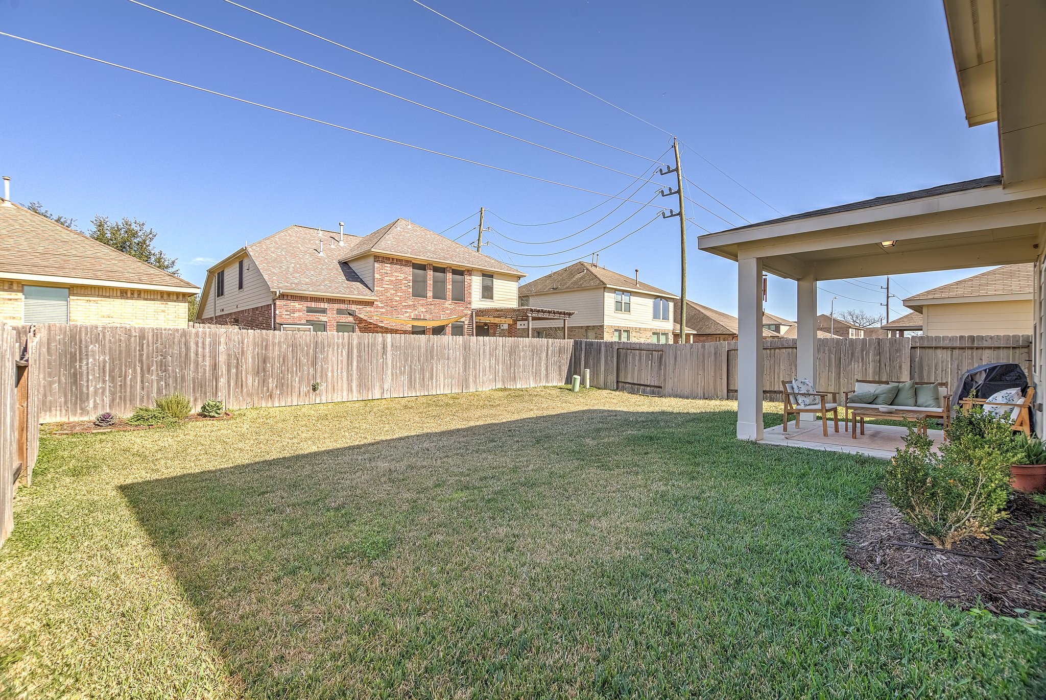 6014 Prince Place Drive Rosenberg, TX 77471 - Photo 25 of 28 With a fully fenced layout and easy access from the home, this outdoor space is well suited for pets, weekend gatherings, or simply enjoying time outside.