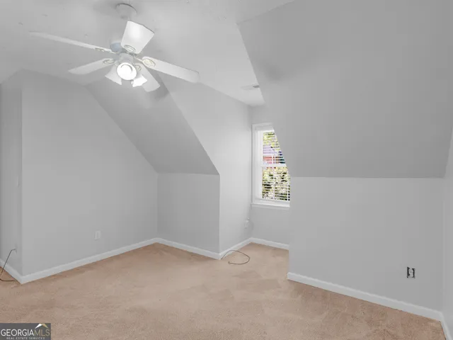 a view of a window in an empty room