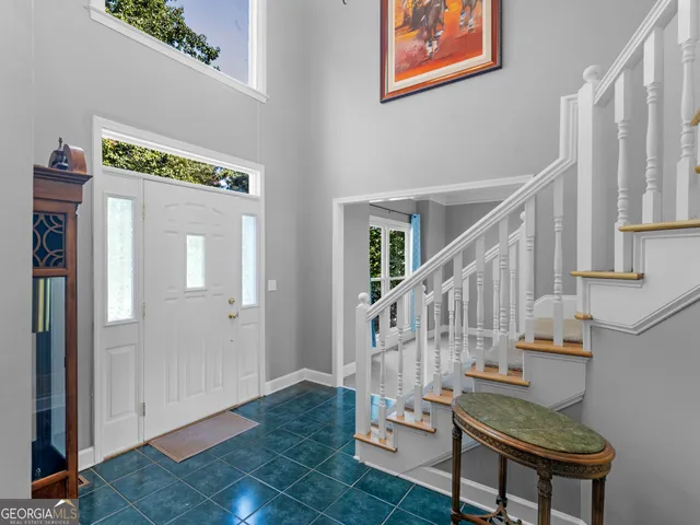 a view of entryway with wooden floor
