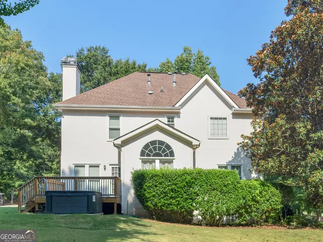 an aerial view of residential house with outdoor space