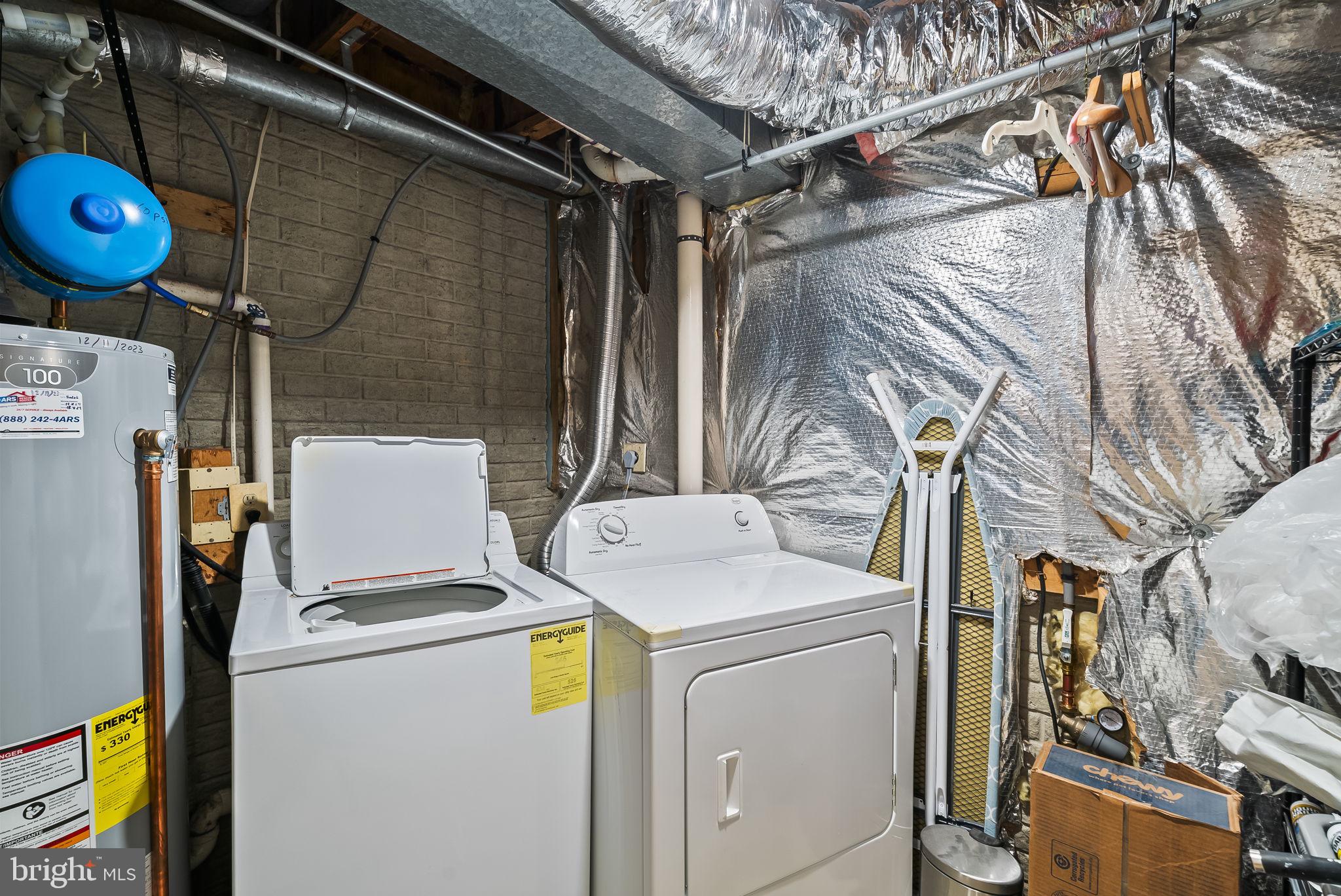 1989 Bowline Loop Woodbridge, VA 22192 - Photo 25 of 30 a utility room with dryer and washer