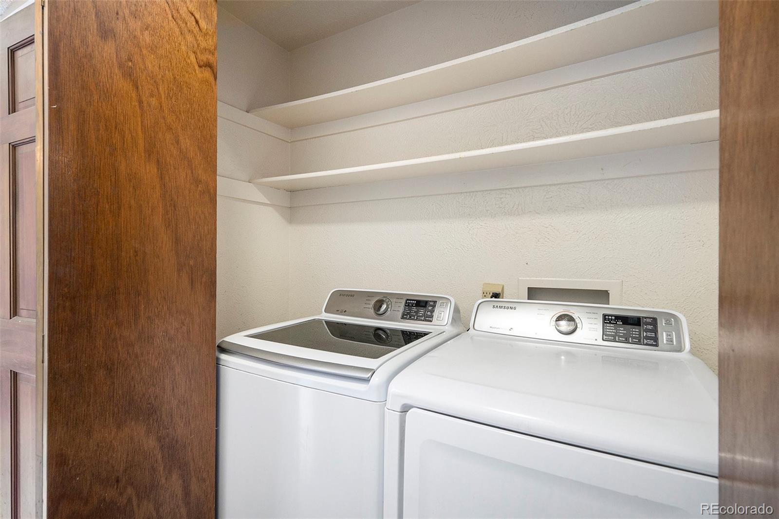 136 South Eagle Circle Aurora, CO 80012 - Photo 19 of 23 a utility room with dryer and washer