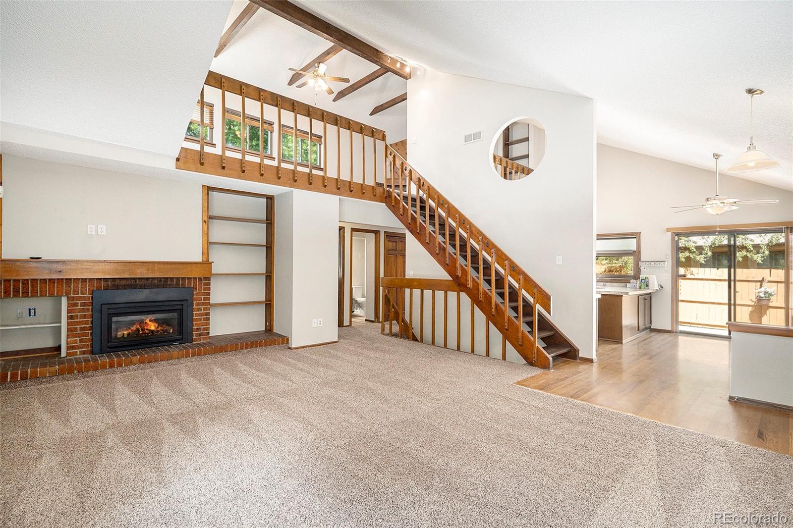 136 South Eagle Circle Aurora, CO 80012 - Photo 5 of 23 a view of an entryway with a staircase