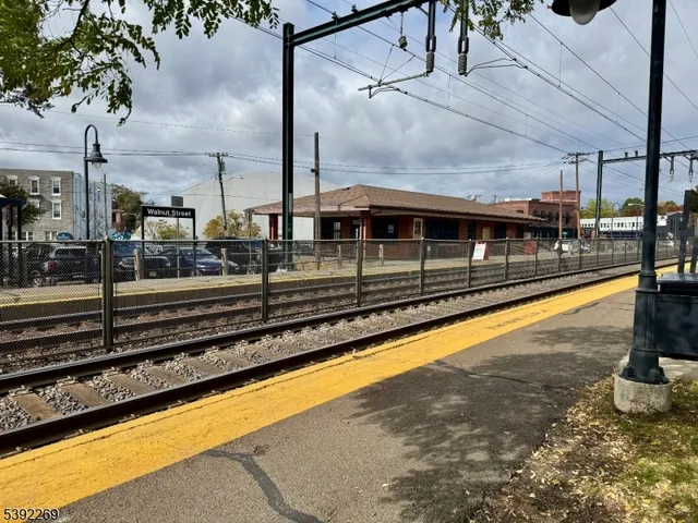 a view of a swimming pool with a yard