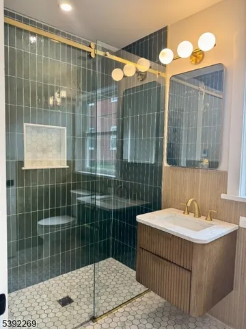 a bathroom with a sink and mirror