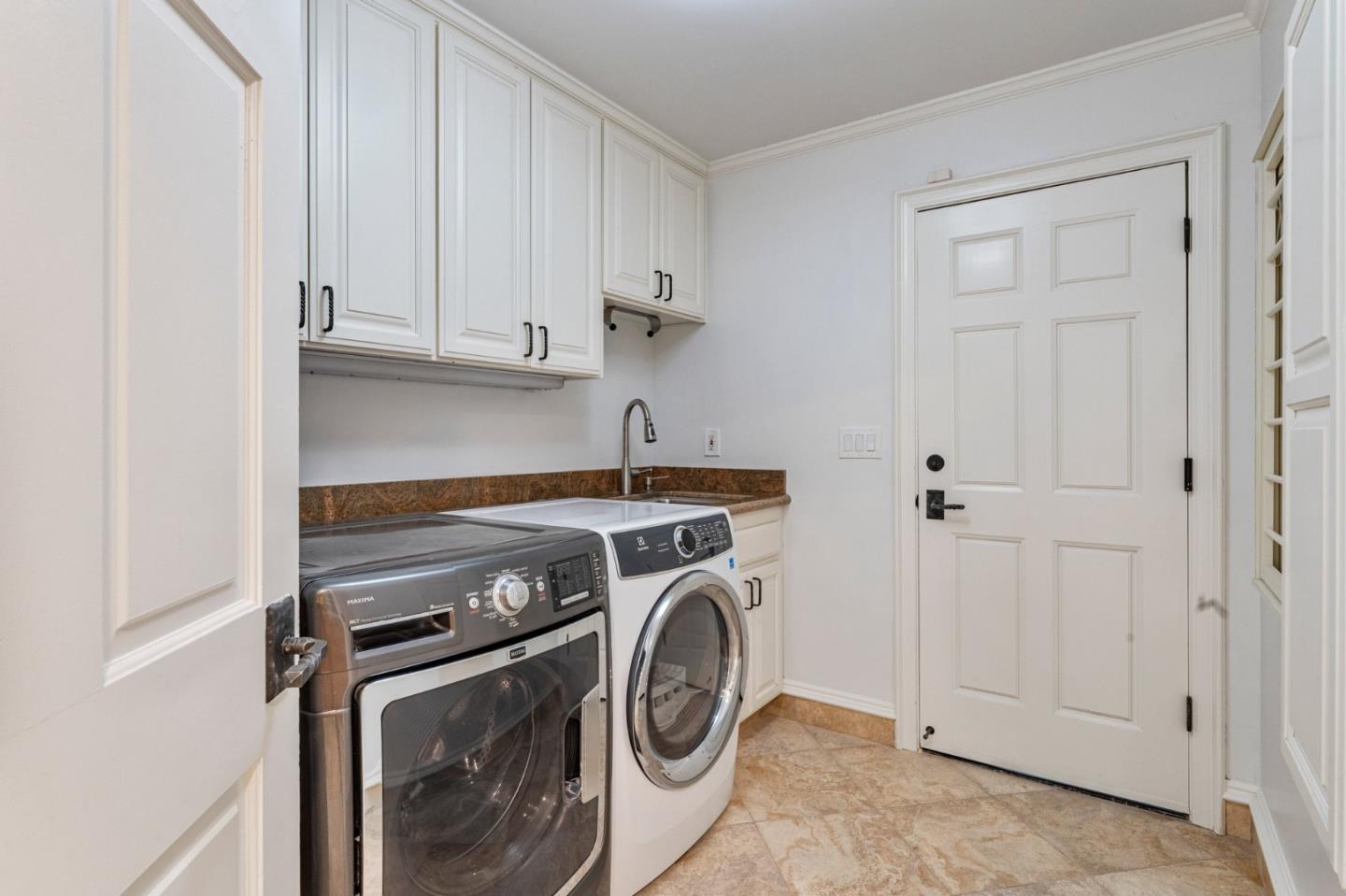 1080 Finley Road Pleasanton, CA 94588 - Photo 60 of 85 a utility room with dryer and washer
