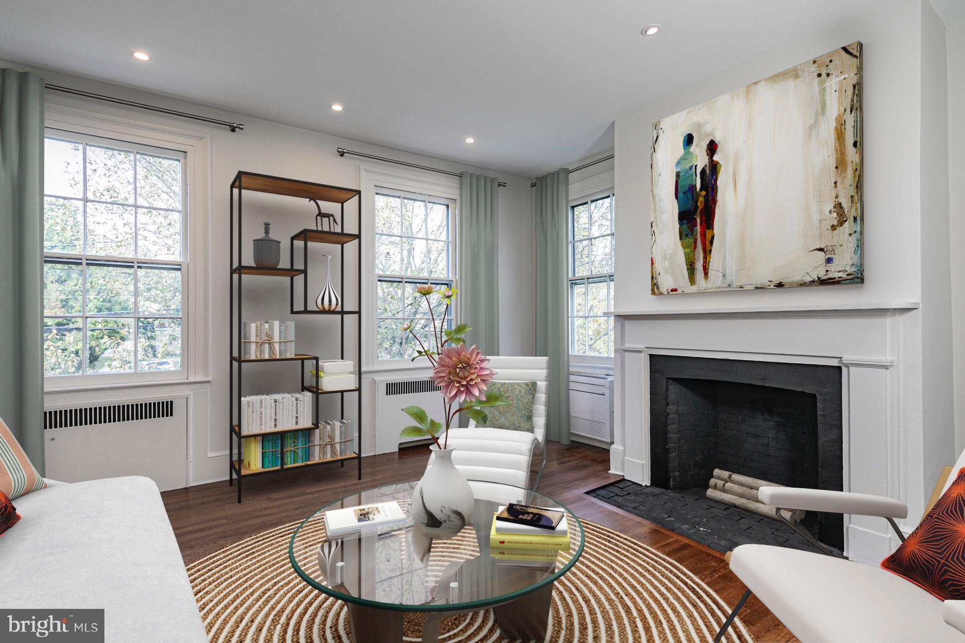 40 Mercer Street Princeton, NJ 08540 - Photo 15 of 35 a living room with furniture a window and a fireplace