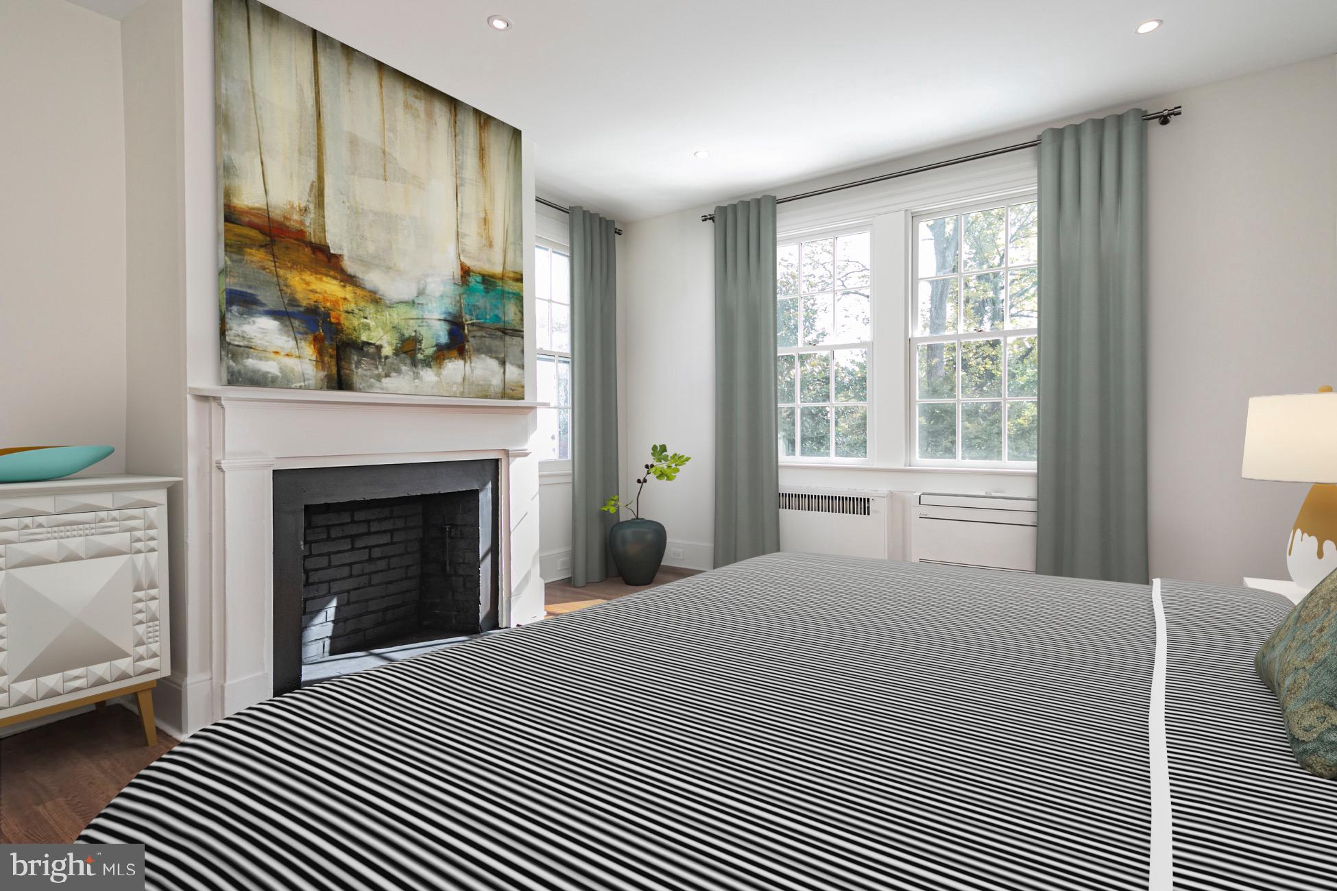 40 Mercer Street Princeton, NJ 08540 - Photo 18 of 35 a bedroom with a large bed and a large window