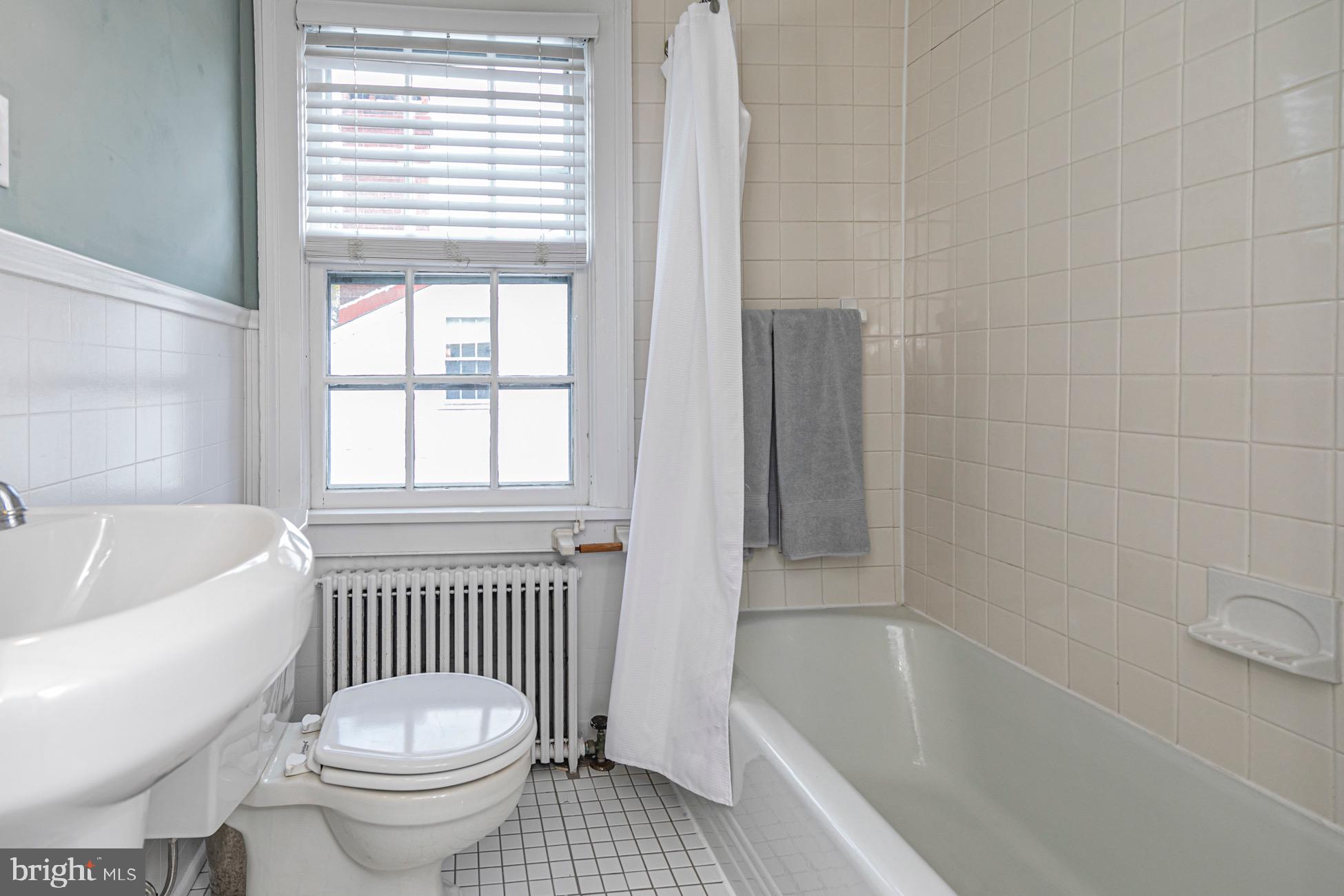 40 Mercer Street Princeton, NJ 08540 - Photo 25 of 35 a bathroom with a sink and a bathtub