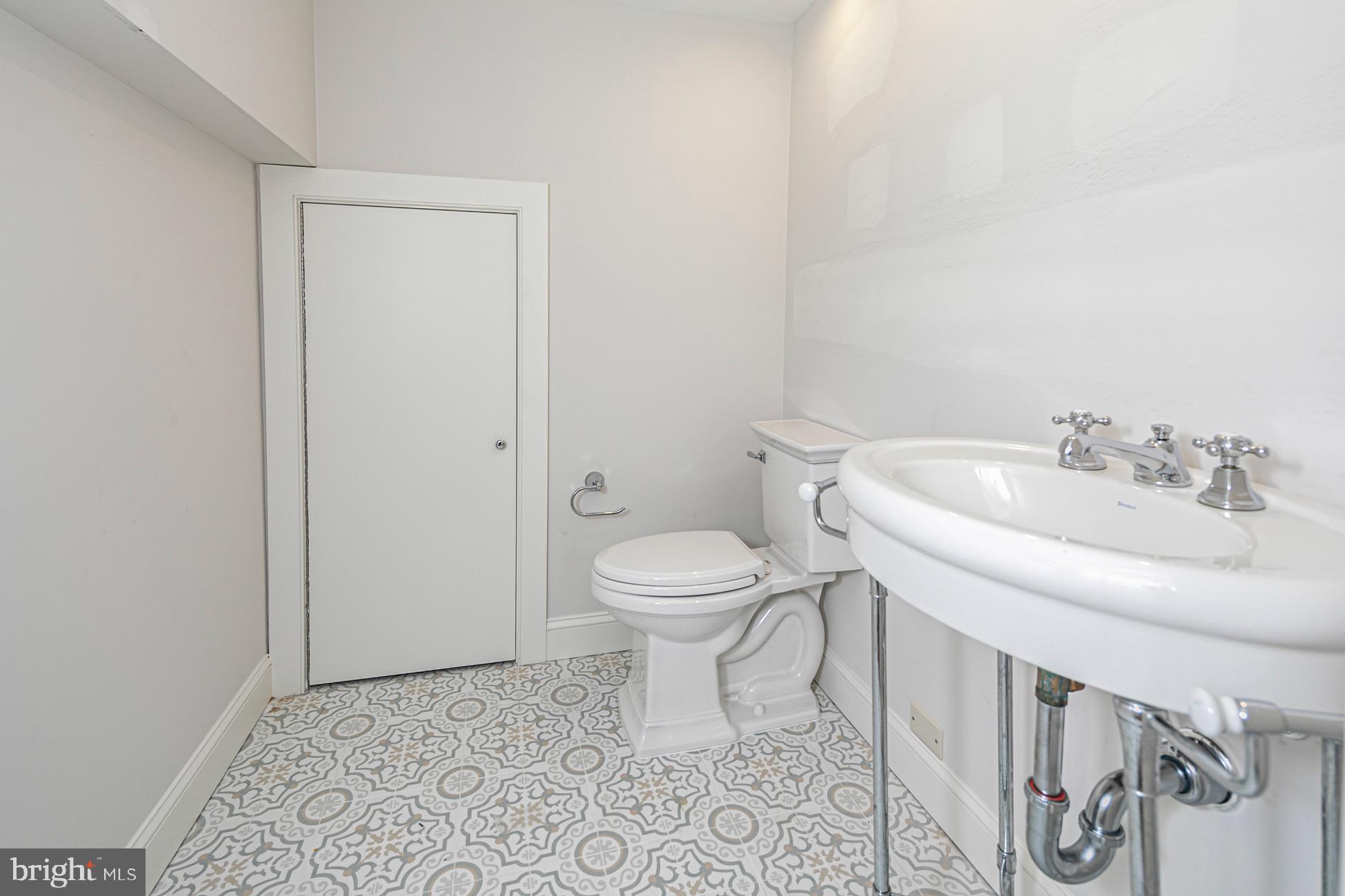 40 Mercer Street Princeton, NJ 08540 - Photo 27 of 35 a bathroom with a toilet and a sink