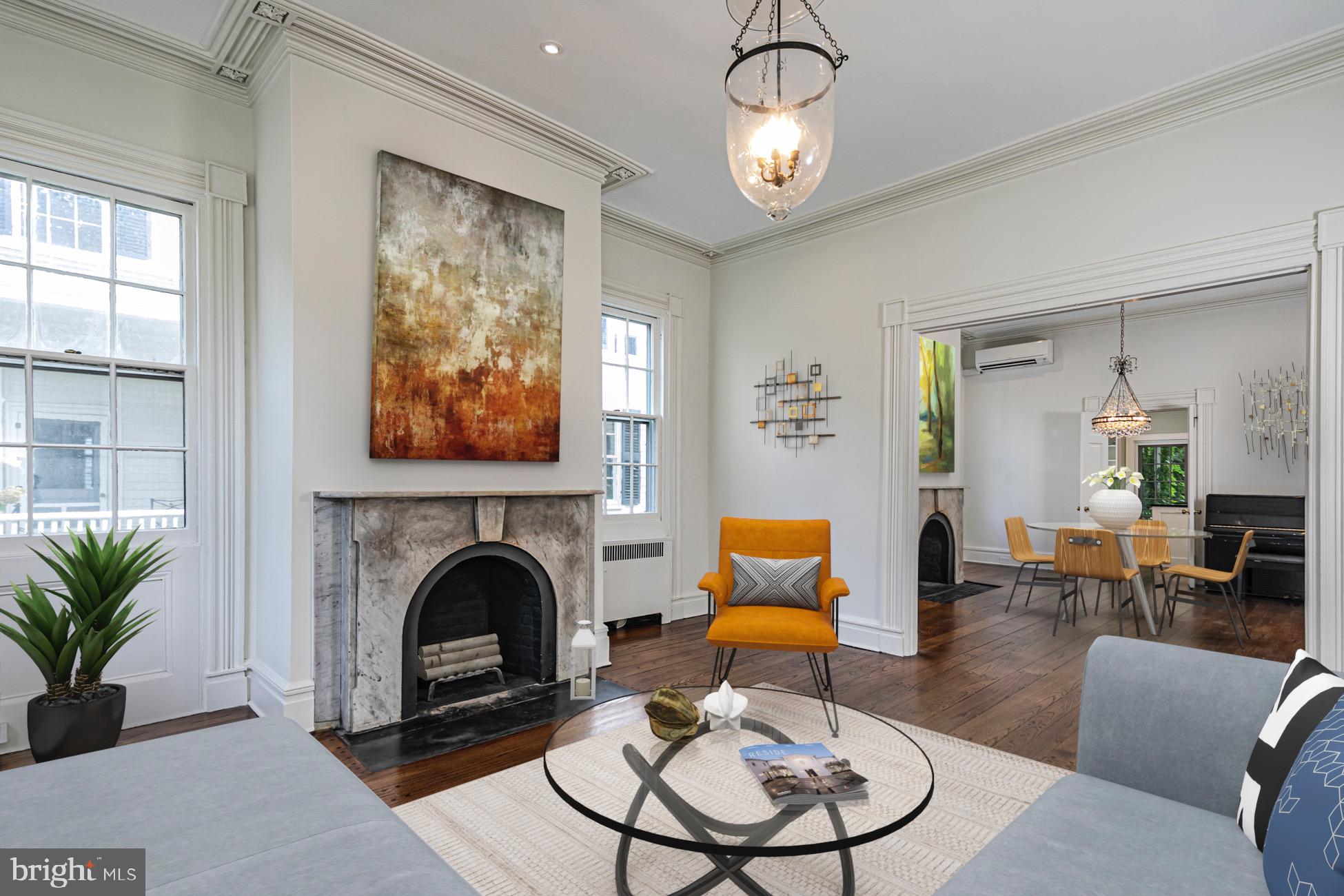 40 Mercer Street Princeton, NJ 08540 - Photo 4 of 35 a living room with furniture chandelier and a fireplace