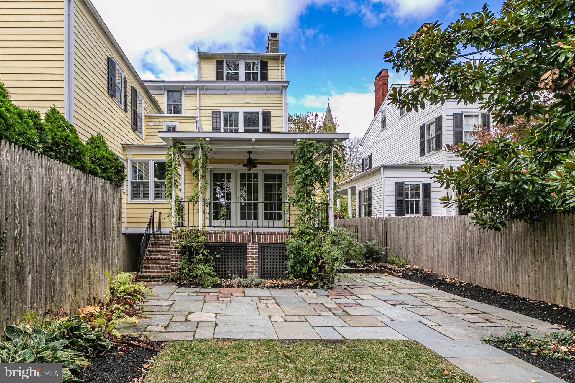 40 Mercer Street Princeton, NJ 08540 - Photo 33 of 35 a front view of a house with a garden