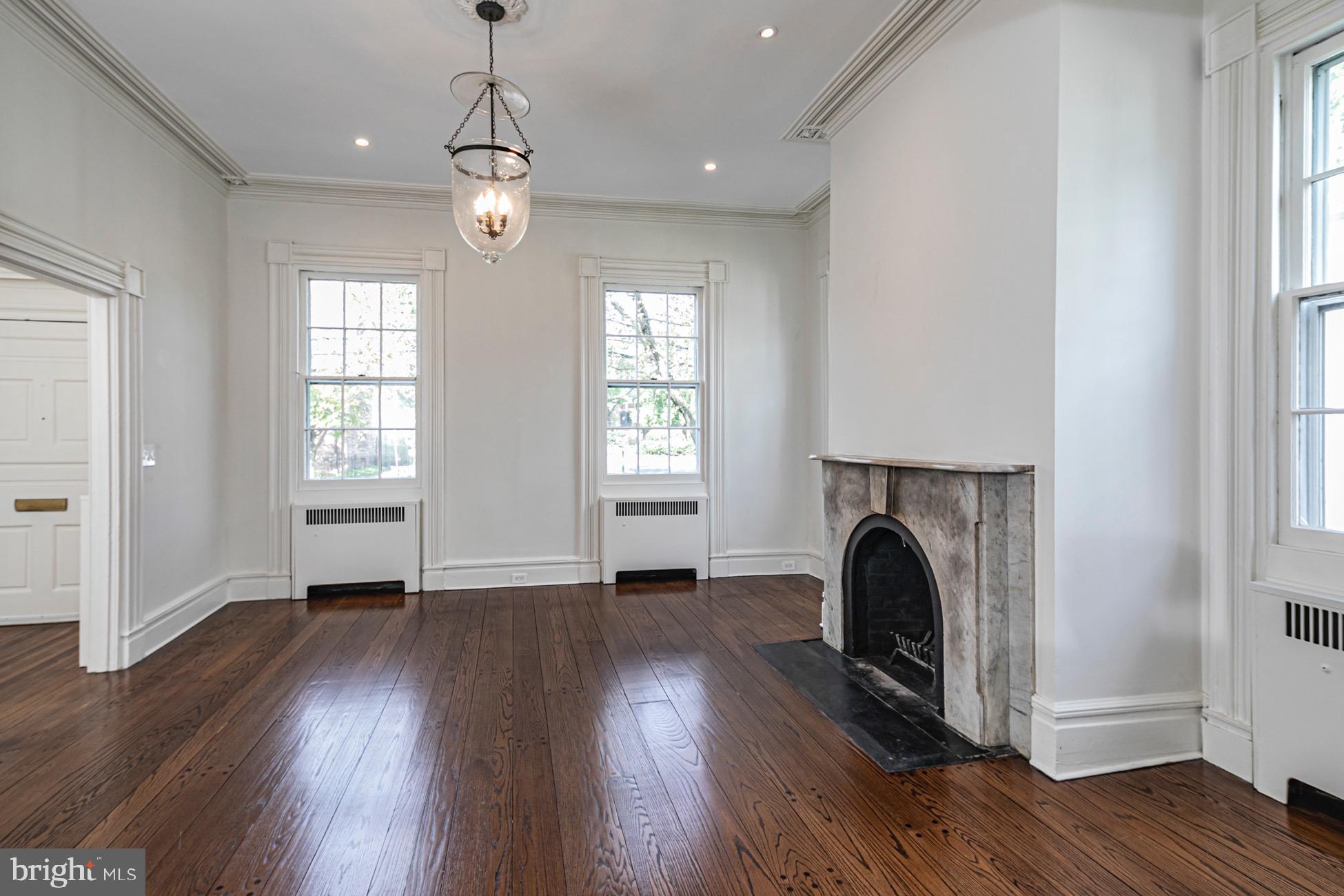 40 Mercer Street Princeton, NJ 08540 - Photo 7 of 35 a view of livingroom with washer and dryer wooden floor