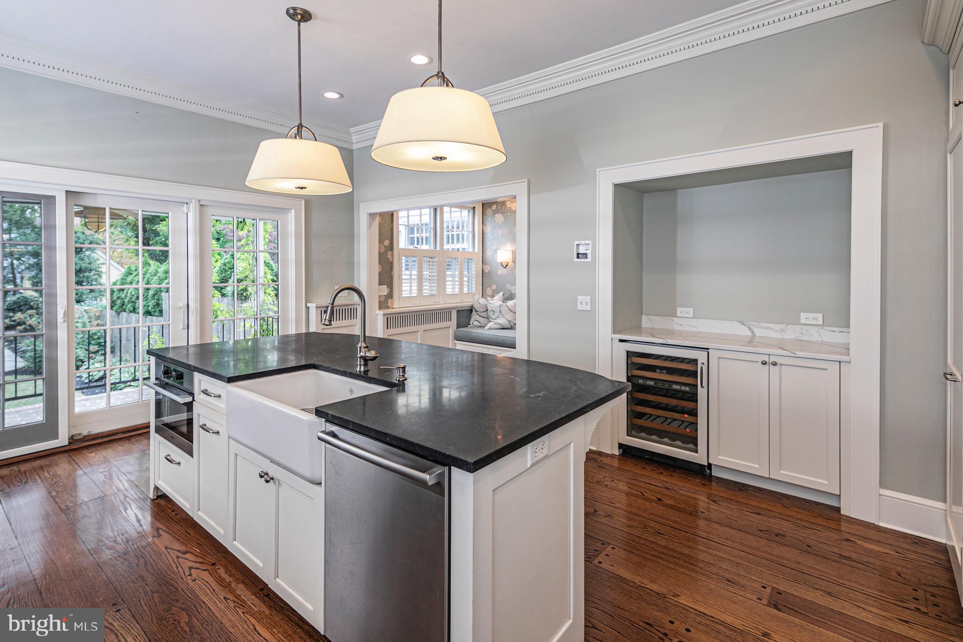 40 Mercer Street Princeton, NJ 08540 - Photo 9 of 35 a kitchen with stainless steel appliances granite countertop a sink a stove and a large window