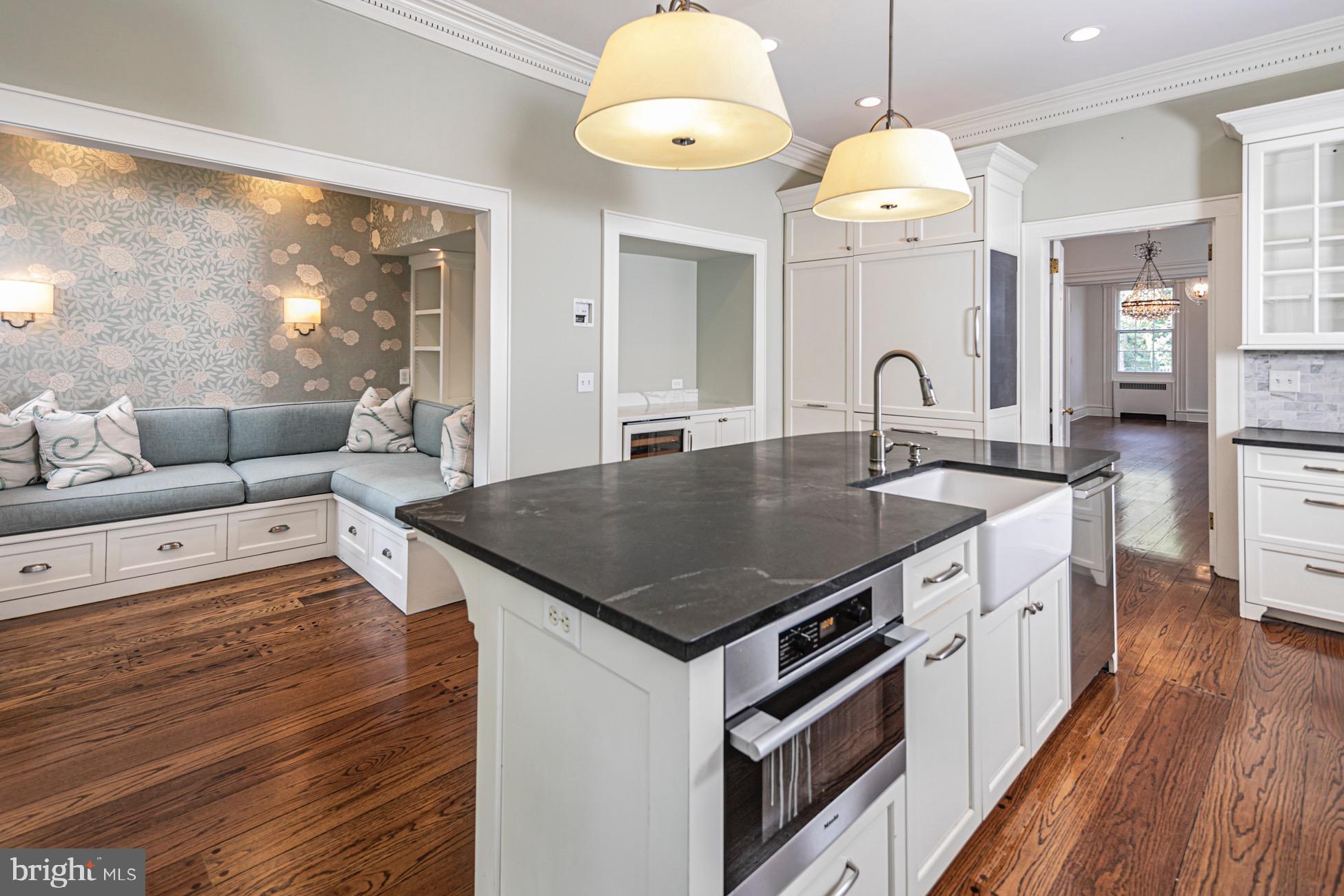 40 Mercer Street Princeton, NJ 08540 - Photo 10 of 35 a kitchen with a stove window and wooden floor