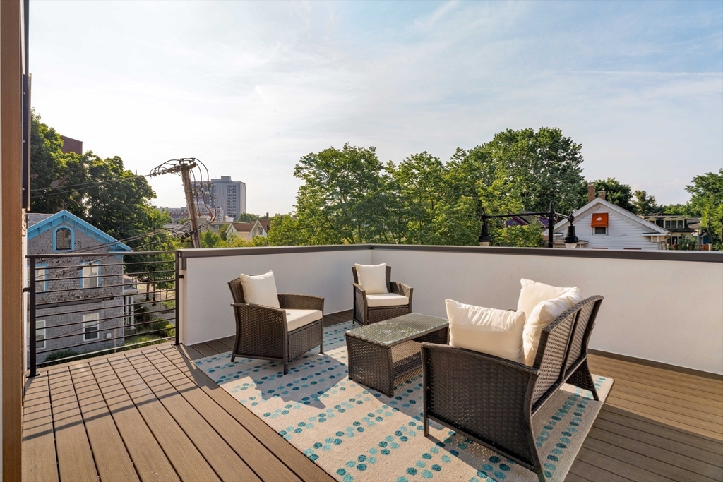 2 Soden Street, Unit 2 Cambridge, MA 02139 - Photo 24 of 38 a view of a terrace with furniture
