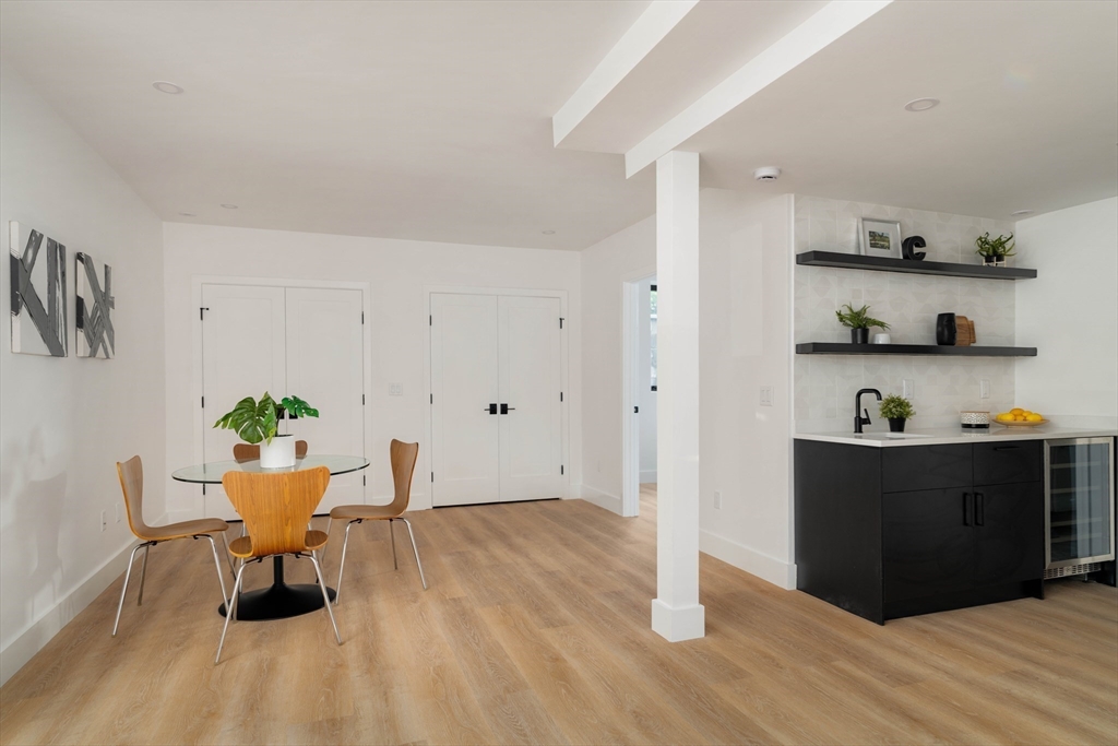 2 Soden Street, Unit 2 Cambridge, MA 02139 - Photo 28 of 38 a workspace with wooden floor