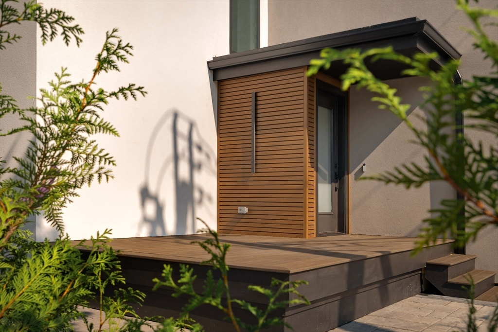 2 Soden Street, Unit 2 Cambridge, MA 02139 - Photo 34 of 38 a view of a backyard with a sitting area