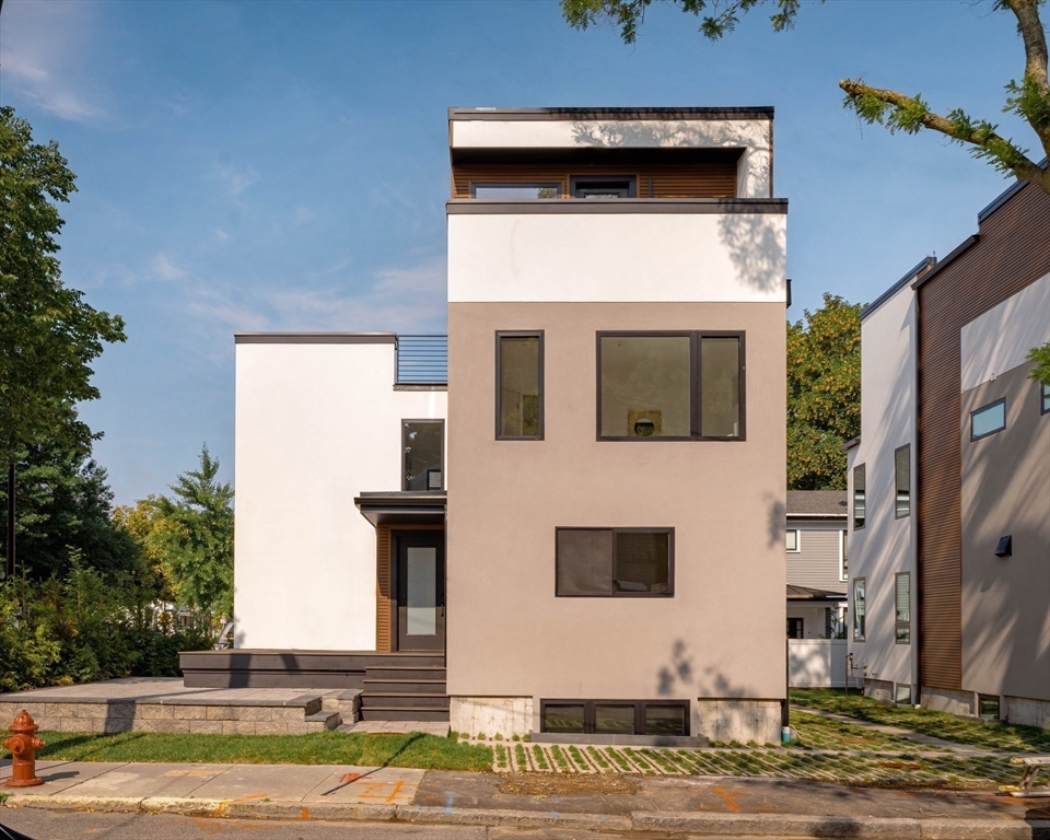 2 Soden Street, Unit 2 Cambridge, MA 02139 - Photo 35 of 38 a view of a house with a street