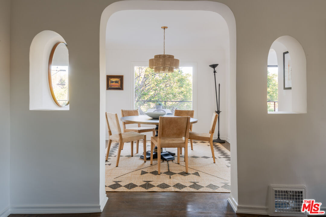 3017 Fall Avenue Los Angeles, CA 90026 - Photo 1 of 1 a dining room with furniture and window