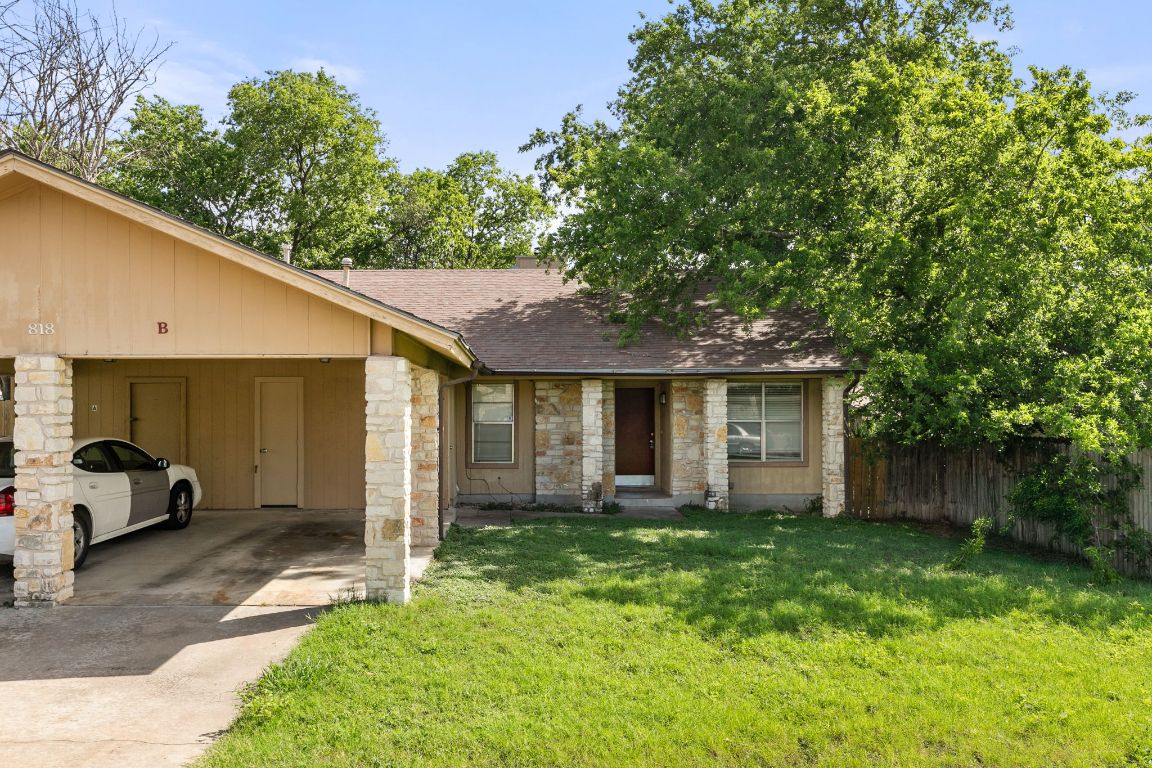 818 Sirocco Drive, Unit B Austin, TX 78745 - Photo 2 of 34 a front view of a house with garden