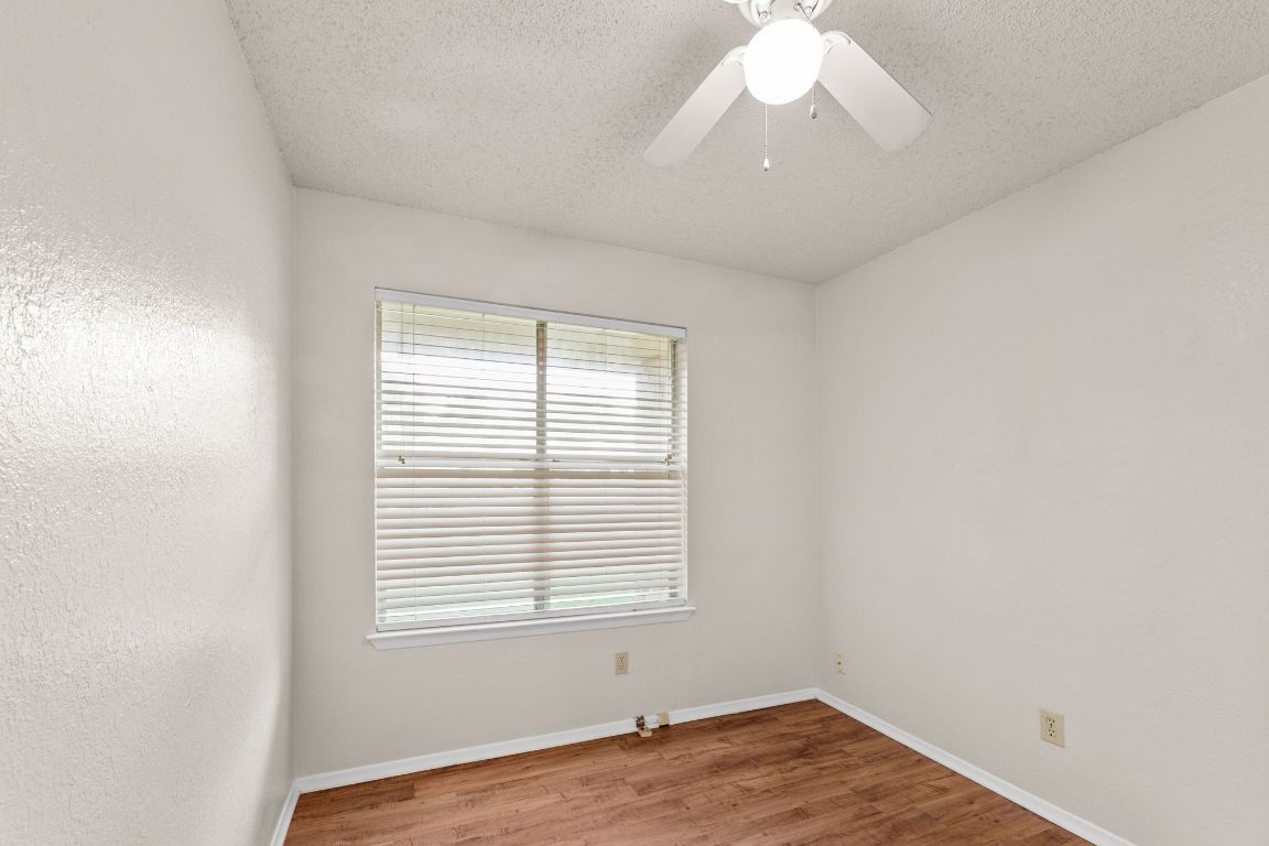 818 Sirocco Drive, Unit B Austin, TX 78745 - Photo 22 of 34 an empty room with a window