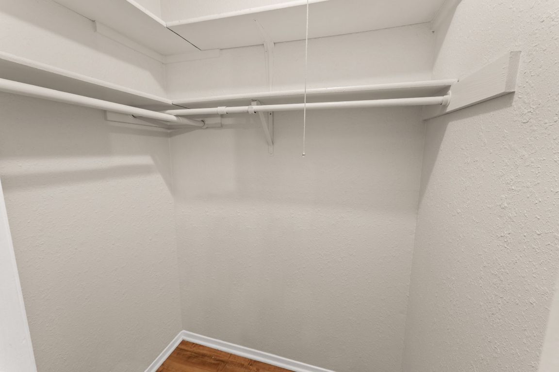 818 Sirocco Drive, Unit B Austin, TX 78745 - Photo 28 of 34 a view of a room with shelf on the wall